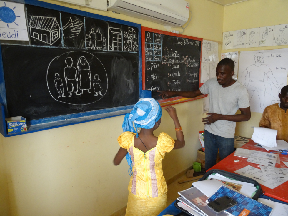Teacher and pupil in action